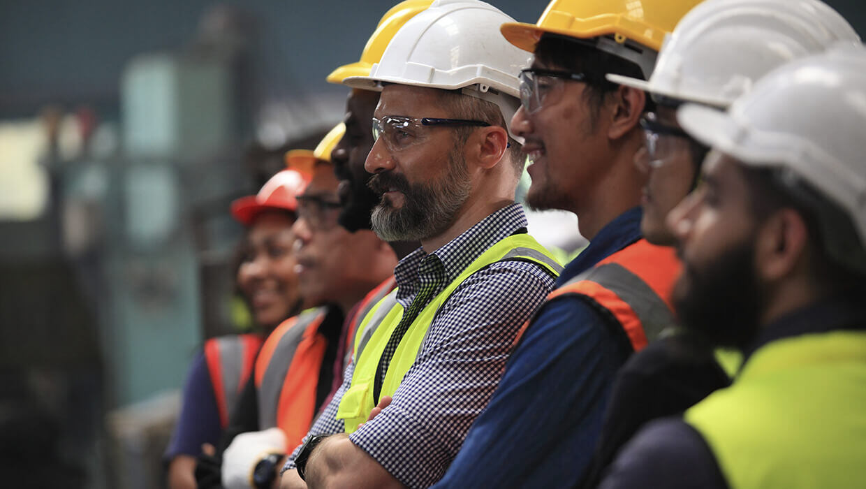 Markets-Engineers-Group-with-Hard-Hats Markets-Engineers-Group-with-Hard-Hats